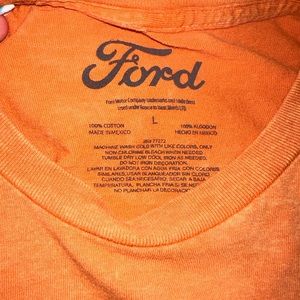 Faded orange Ford crop top
